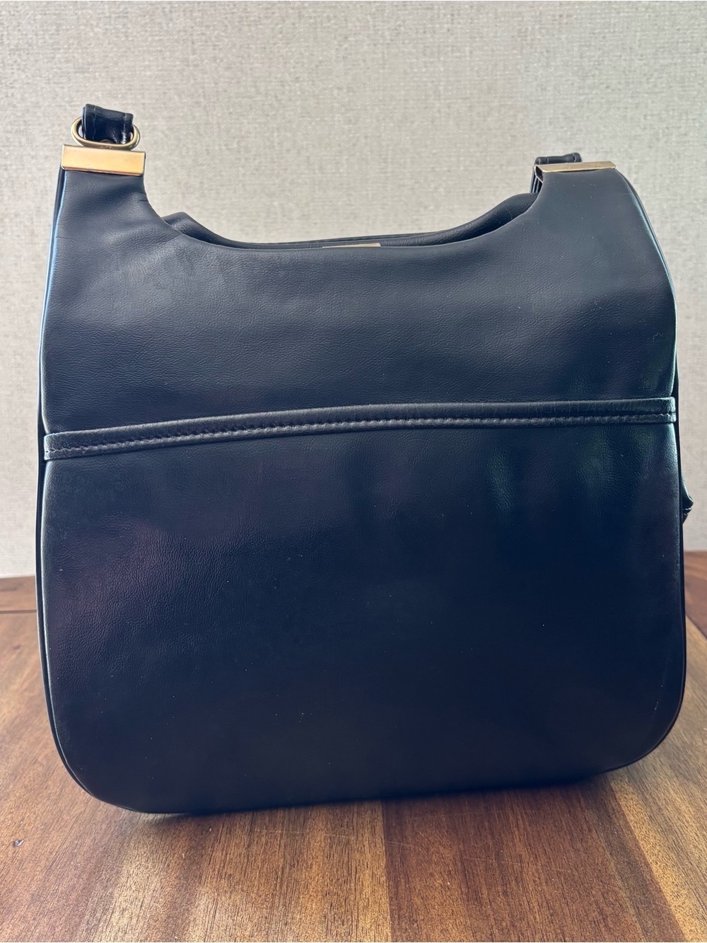 Classic Black Leather Shoulder Bag with Gold Accents